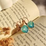 Aqua heart-shaped resin earrings