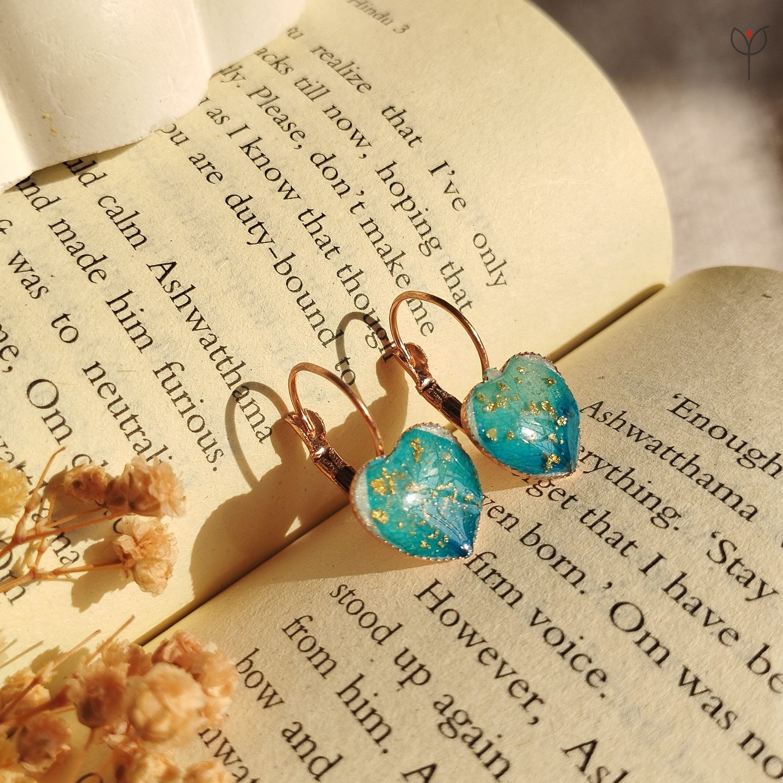 aqua-heart-flower-resin-drops Aqua heart-shaped resin earrings