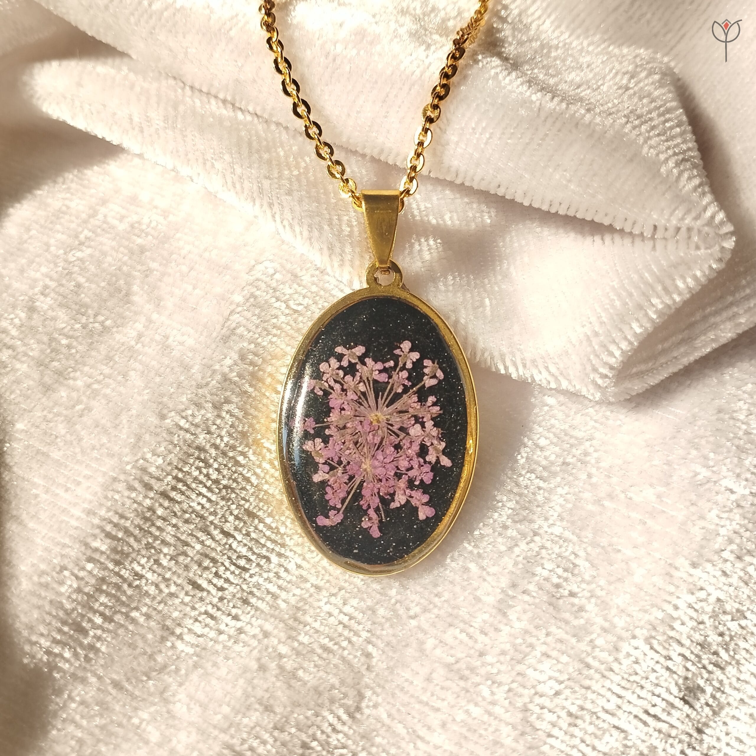 Handcrafted gold necklace featuring the Midnight Petal Orbit Pendant