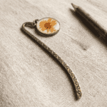 Close-up of Solar Swirl bookmark showing the etched wave pattern