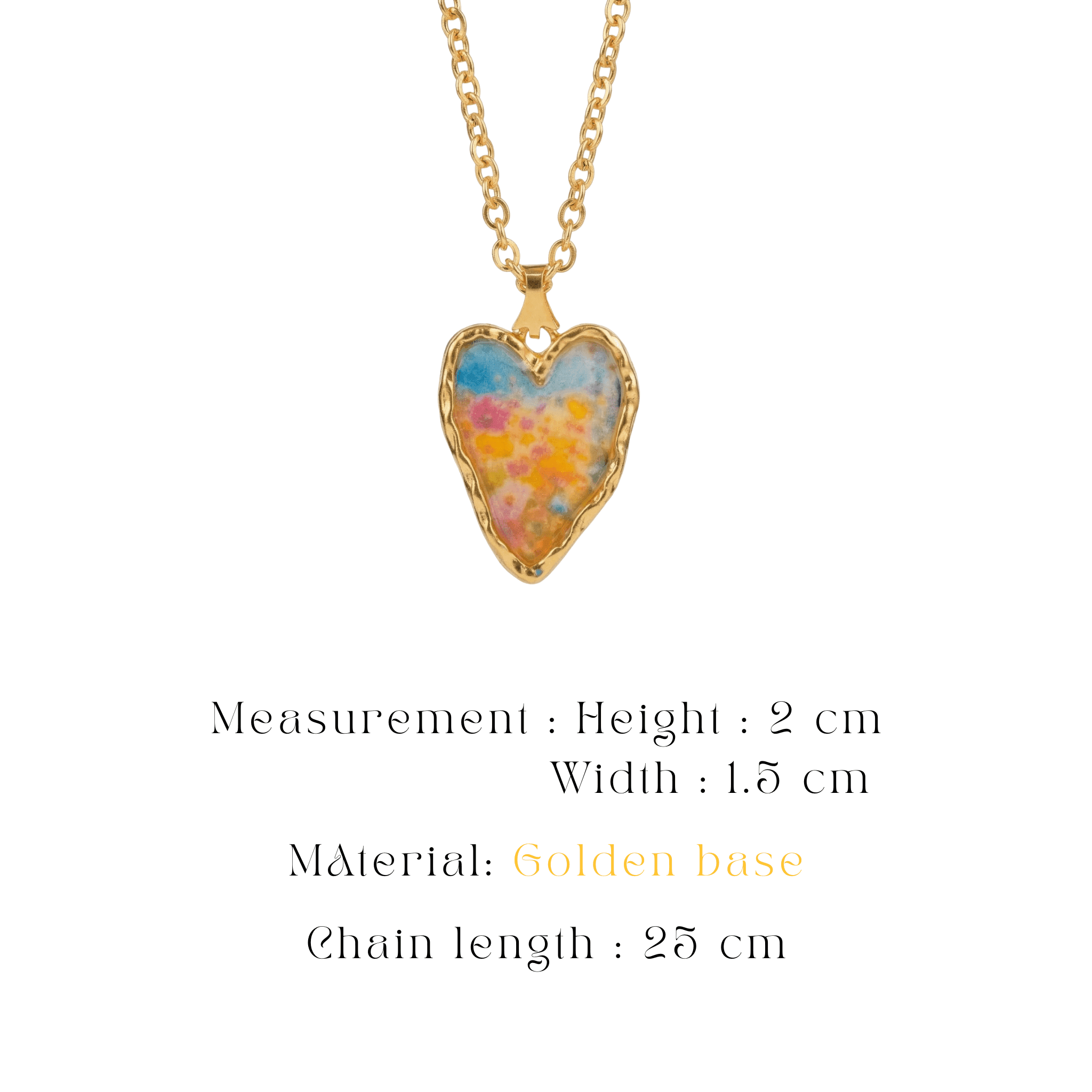 dreamy-meadow-heart-pendant Gold-toned heart pendant featuring a soft-focus meadow