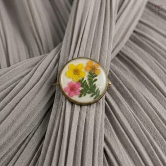 Real fern leaf and dried flowers in an Ancient Meadow Resin Brooch
