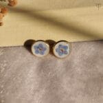 Blue forget-me-not flowers in clear resin