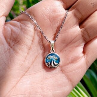 Frosted Alpine Pendant with white flowers in blue resin