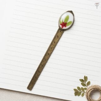 Gilded Botany Measure bookmark with red starburst flower