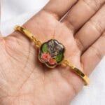 Botanical gold bracelet with real flowers and handcrafted resin