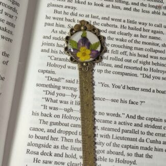 Handmade resin bookmark featuring real hydrangea, plum flower,