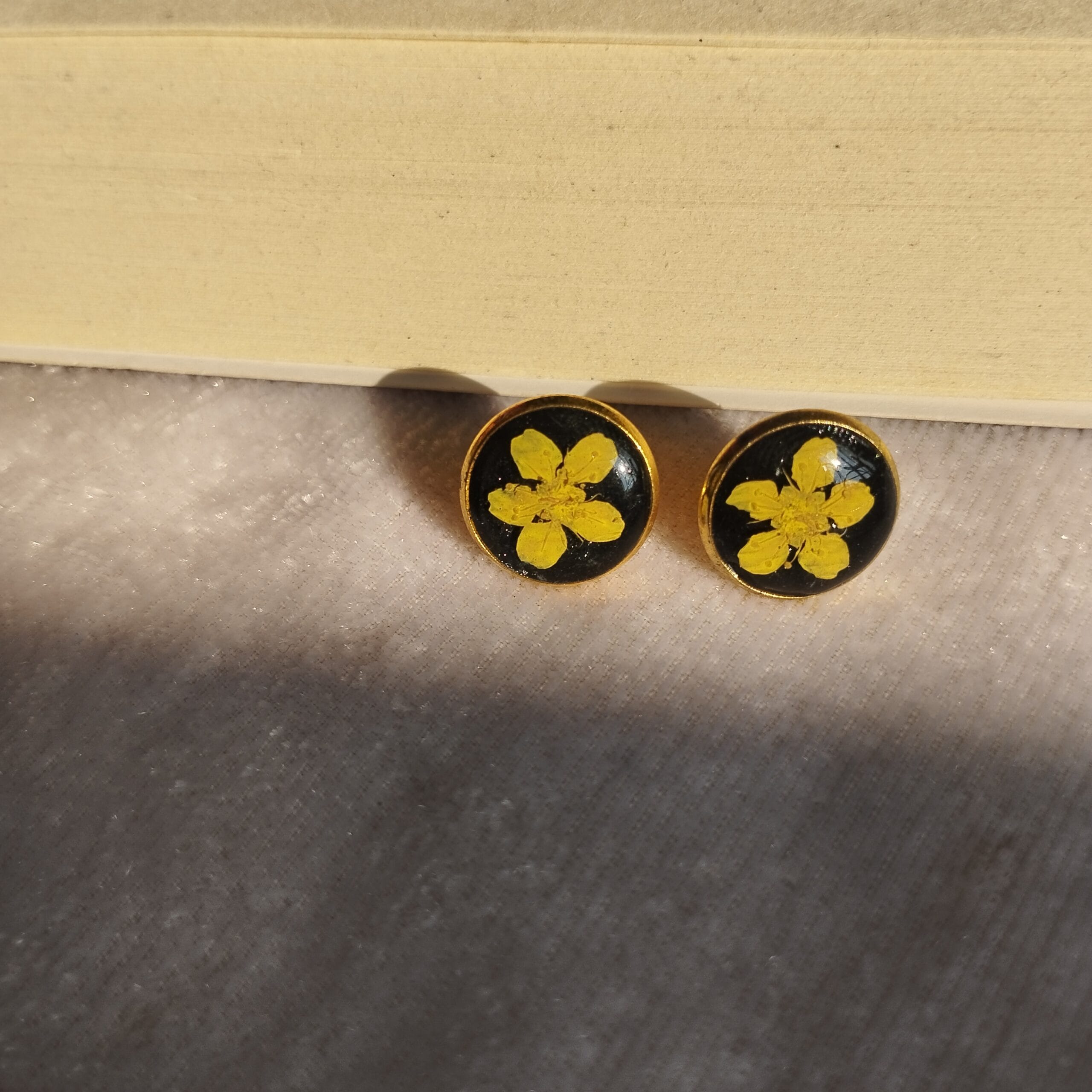 little-plum-earrings-black-resin-gold-bezel Black resin studs with gold base