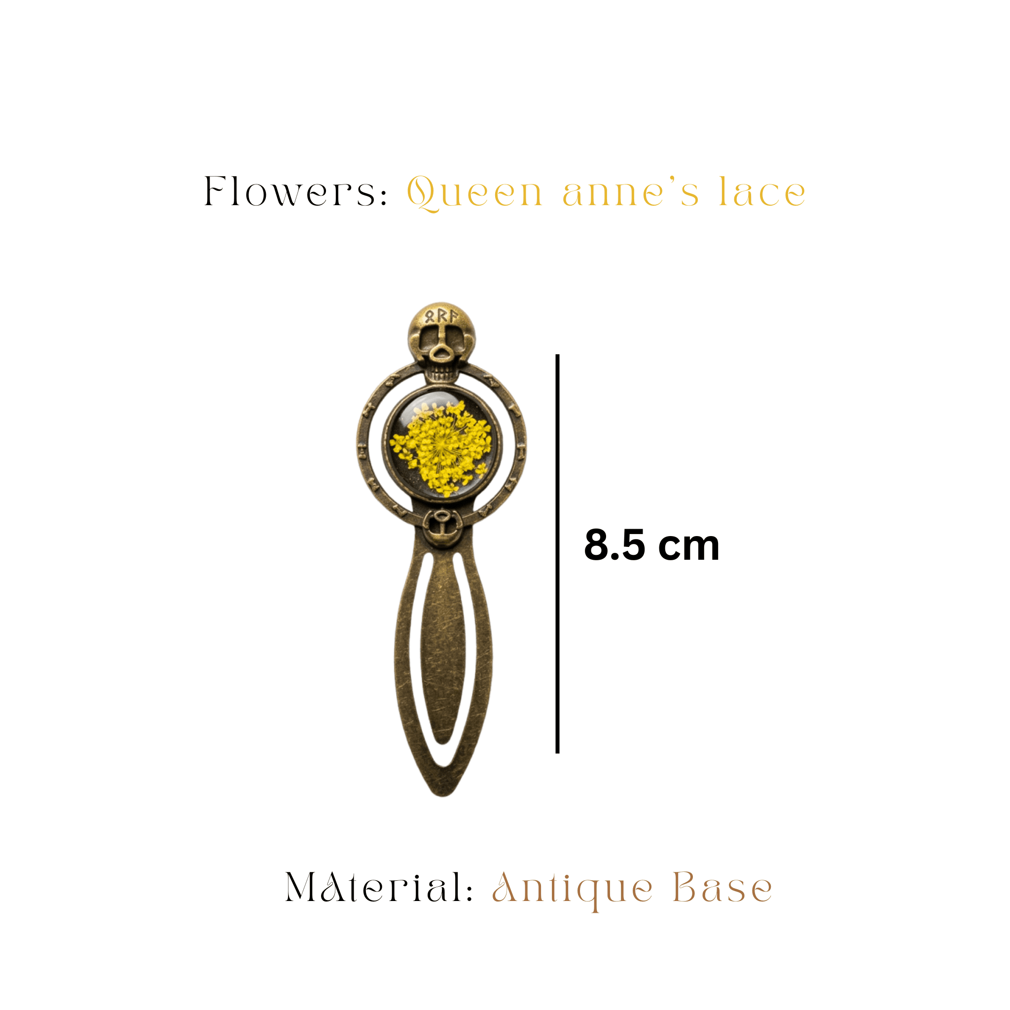 Antique bronze skull bookmark with runic symbols and yellow Queen Anne's Lace
