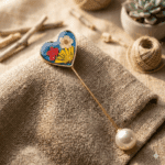 Golden base saree pin with preserved flowers and pearl