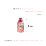 Handcrafted pink and white floral preservation bottle with cork
