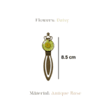 Antique bronze crown bookmark featuring a real green daisy in resin