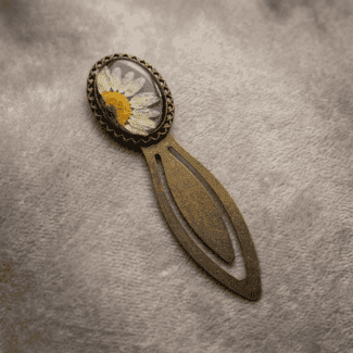 Obsidian Orchid bookmark with a real white daisy in resin