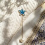 Queen’s Wand Resin Brooch with real flowers and golden frame