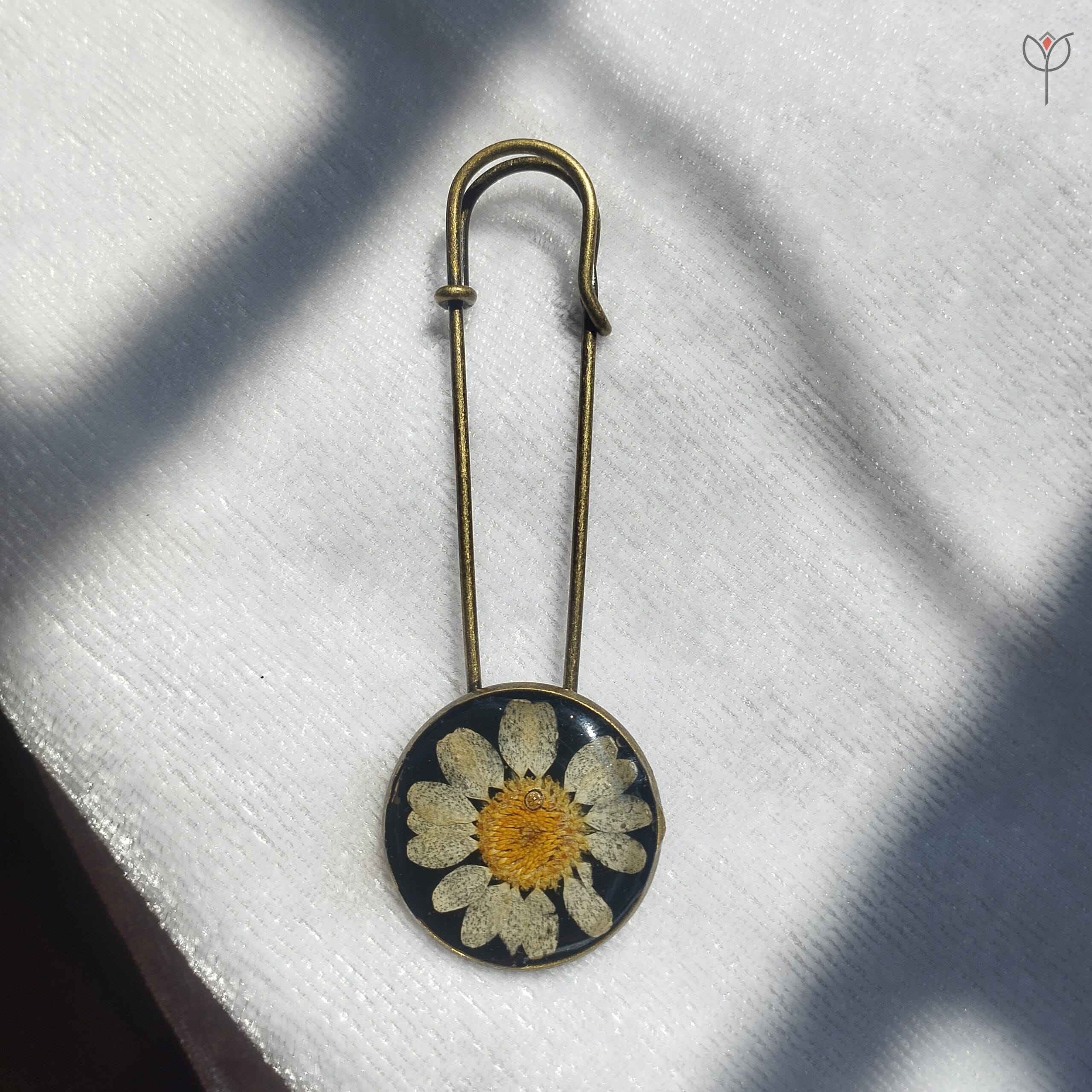 Close-up of Classic Daisy Flower Brooch