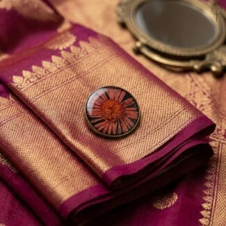 Close-up of an Antique Star Resin Brooch