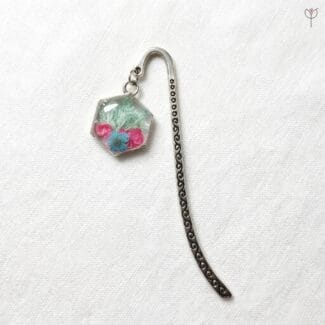 The Glasshouse Hook bookmark with mint Baby's Breath and pink plum flowers