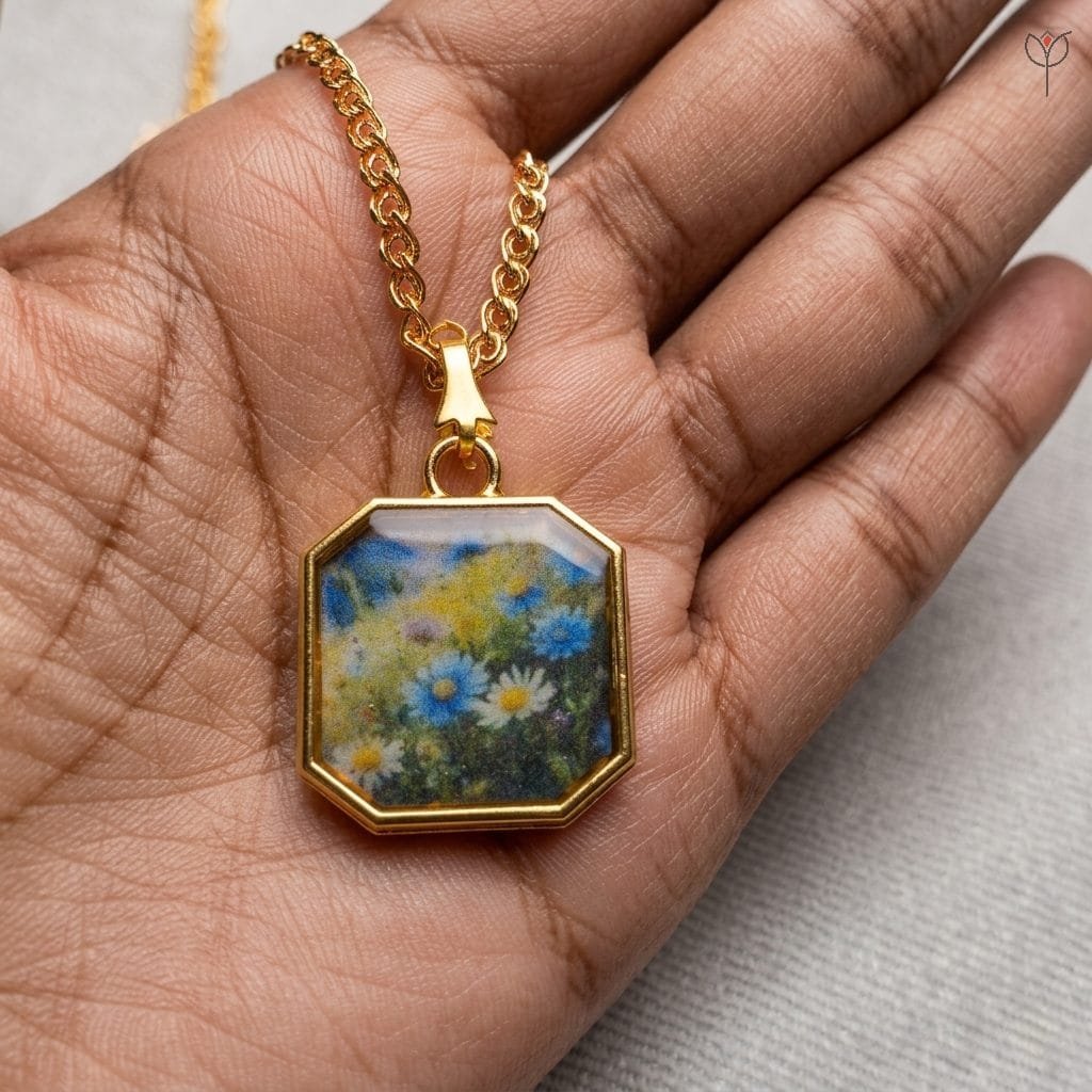 vibrant-meadow-art-jewellery Handcrafted resin necklace featuring a sun-drenched floral illustration