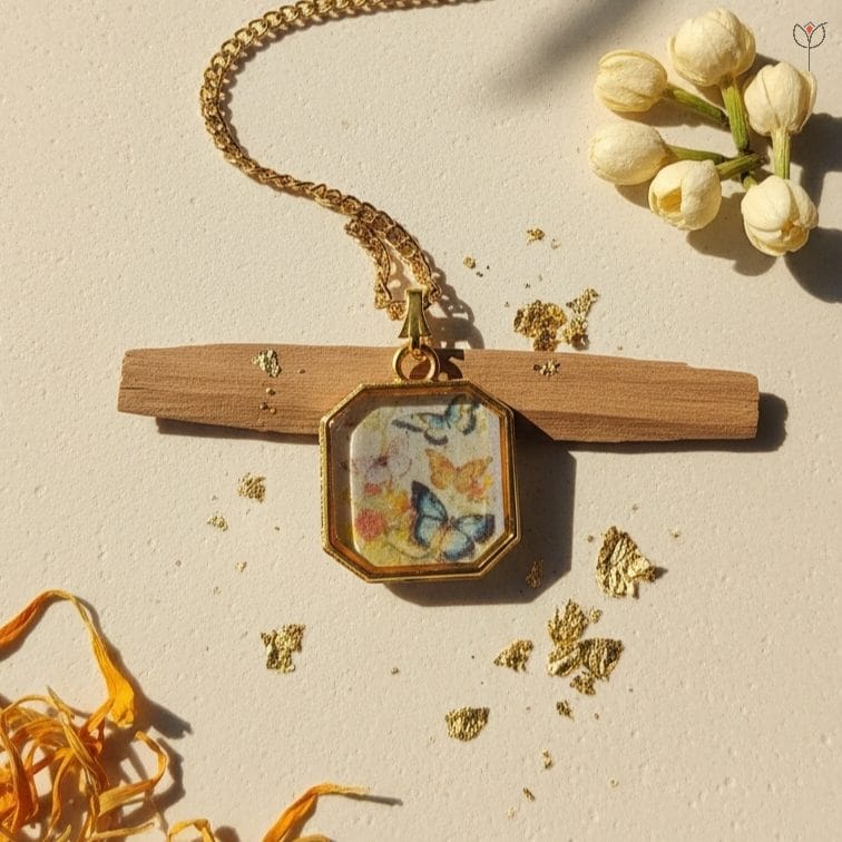 vintage-butterfly-octagon-necklace Octagon gold-framed pendant with vintage butterfly art in resin