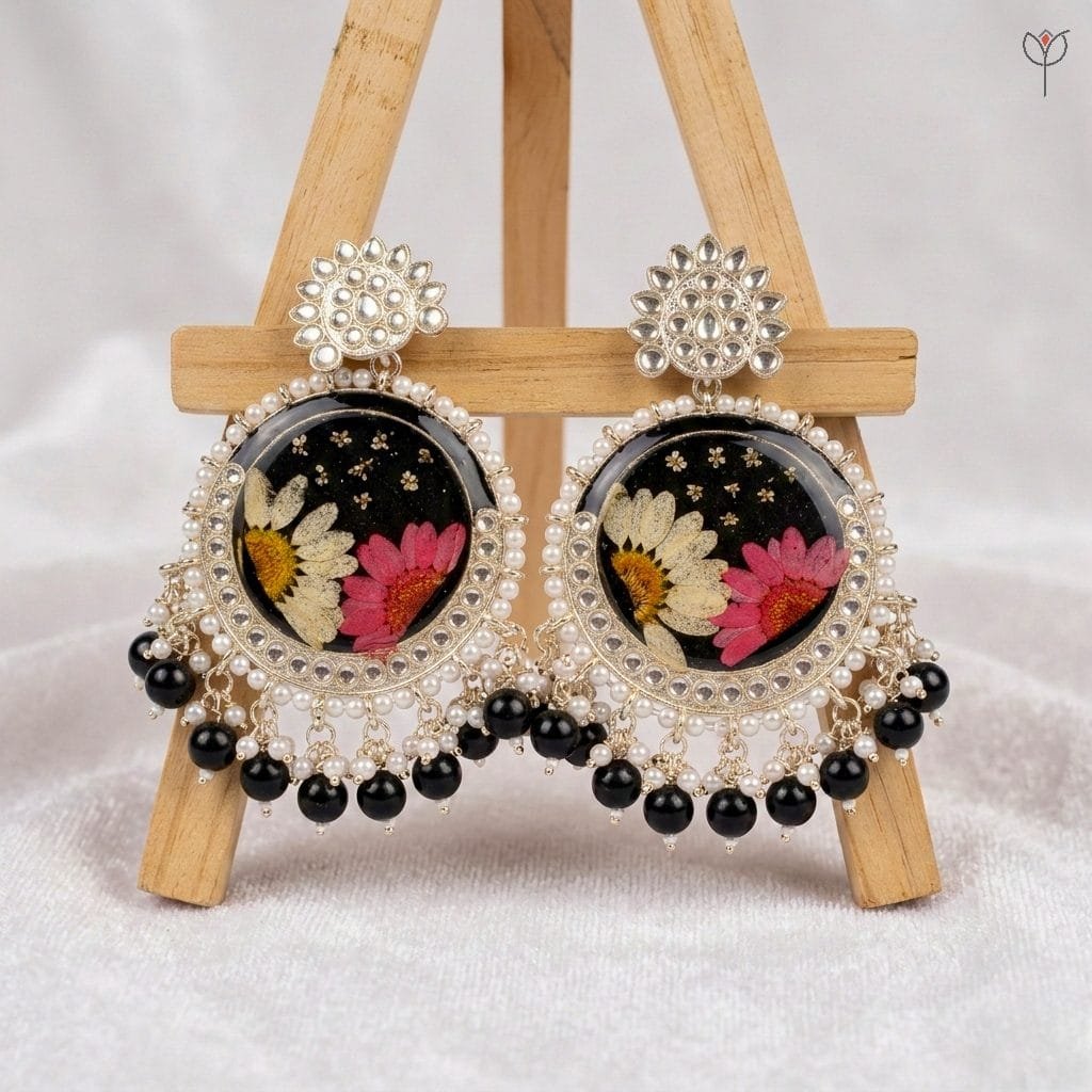 dusk-daisy-kundan-jhumka Dusk Daisy Kundan Jhumka featuring real pink and white daisies in black resin