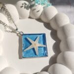 Ocean star pendant with real starfish in silver base
