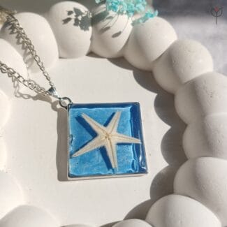 Ocean star pendant with real starfish in silver base