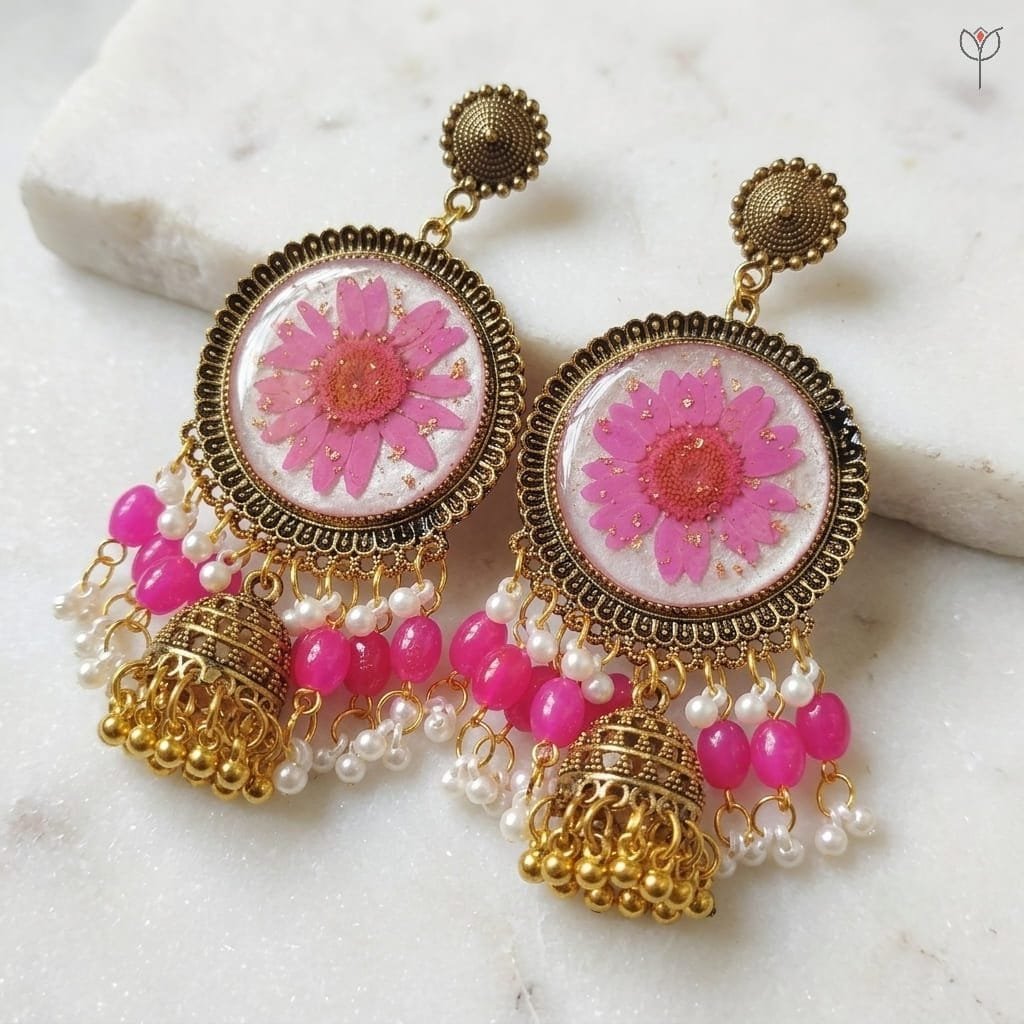 gilded-daisy-jhumka-closeup-pink-daisy-flower Close-up of real pink daisy flower with gold flecks in Gilded Daisy Jhumka