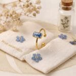 Golden Autumn Ring worn on hand, showcasing its adjustable band and everyday botanical jewellery style