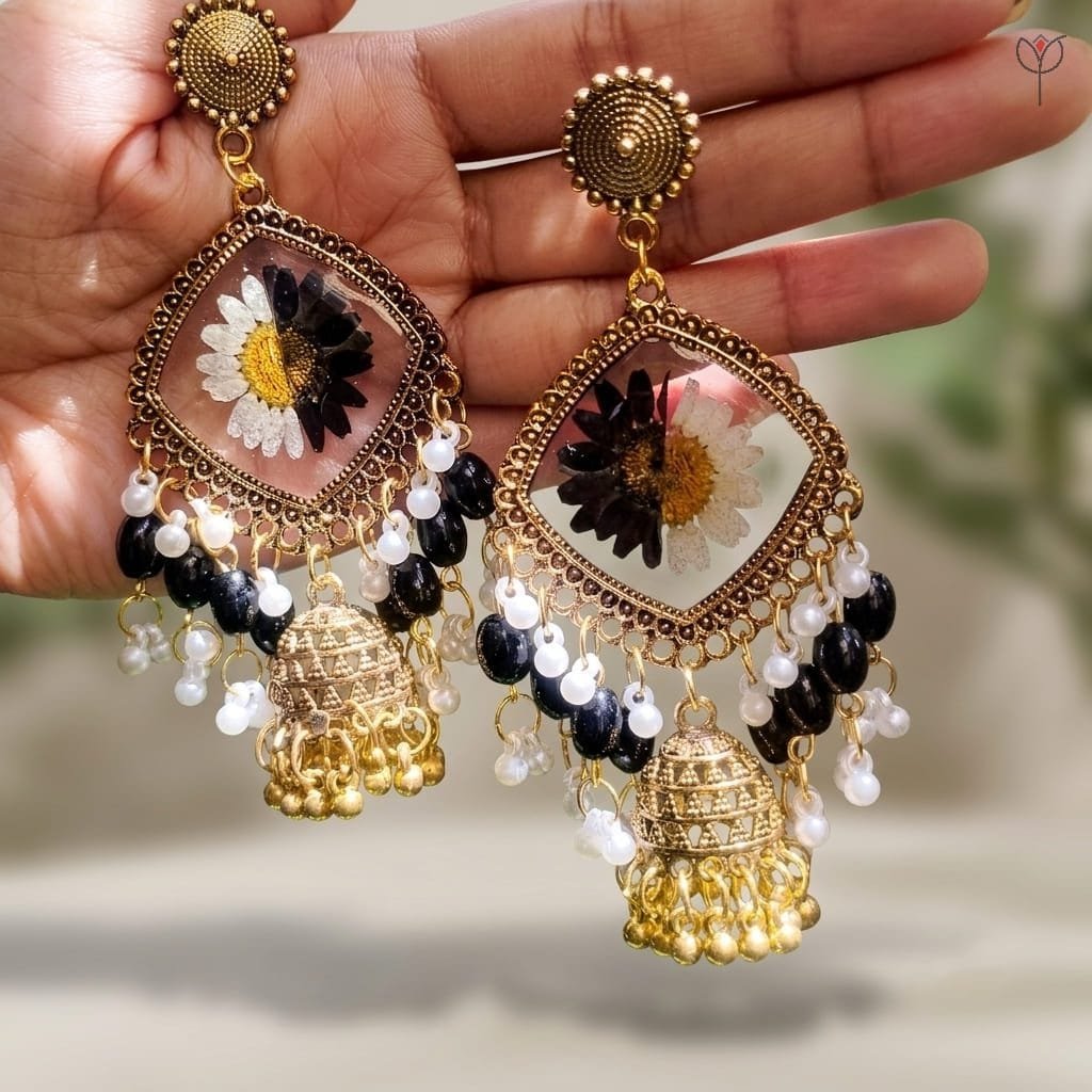 noir-daisy-jhumka-closeup-daisy-flower-detail Close-up of real daisy flower in golden oxidised Noir Daisy Jhumka