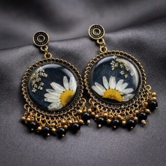 MystikFalls Meadow Noir Jhumkas Real flower botanical resin jhumka earrings in antique brass setting with black bead dangles