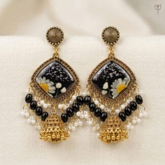 MystikFalls Midnight Garden Jhumkas Real pressed daisy and baby's breath in black resin with antique gold diamond-shaped frame