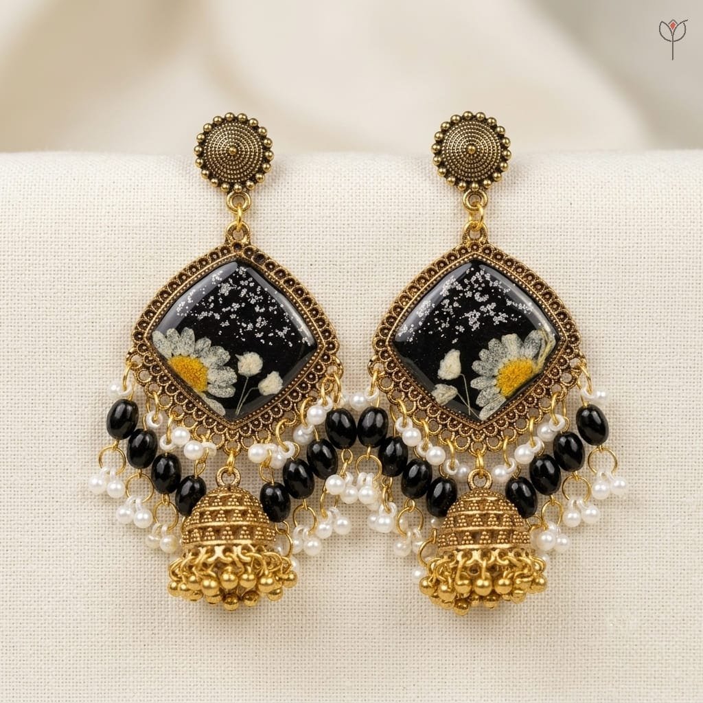 mystikfalls-midnight-garden-jhumkas-pressed-daisy-resin-earrings MystikFalls Midnight Garden Jhumkas Real pressed daisy and baby's breath in black resin with antique gold diamond-shaped frame