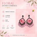MystikFalls Pink Frost Jhumkas styled on natural linen fabric with scattered dried baby's breath – Handcrafted botanical resin jhumka earrings in silver oxidised finish