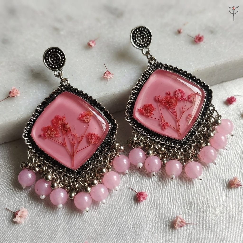 mystikfalls-pink-frost-jhumkas-close-up-resin-flower-detail MystikFalls Pink Frost Jhumkas close-up Delicate preserved baby's breath sprigs