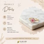 Cherry Spell Ring placed on white marble slab with linen fabric backdrop showing minimal botanical jewellery styling