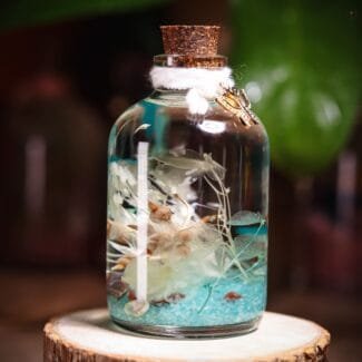 Dreamwave Glass Garden close-up of real preserved dreamy pastel flowers and botanicals floating in clear mineral oil