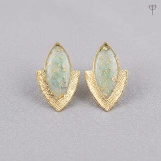 Elara Resin Earrings featuring preserved hydrangea petals with gold foil flakes in a marquise-shaped golden chevron stud setting by MystikFalls