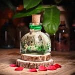 Forest Dewdrop Glass Garden with real baby's breath and hydrangea preserved in mineral oil cork bottle by MystikFalls
