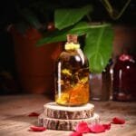 Honeyveil Glass Garden with preserved real flowers in mineral oil cork bottle by MystikFalls