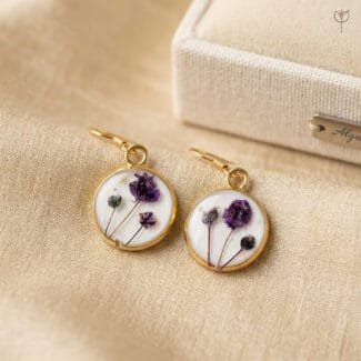 Lavinia Resin Earrings featuring preserved purple baby's breath in a round golden frame with antique gold fish hooks by MystikFalls