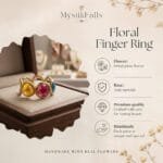 Close-up of three dried plum blossoms sealed in resin on the Mystic Trio Resin Ring from Mystik Falls