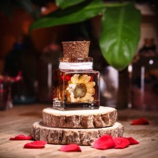 Pocket Sunshine Glass Garden with real preserved bright flowers in mineral oil cork bottle by MystikFalls
