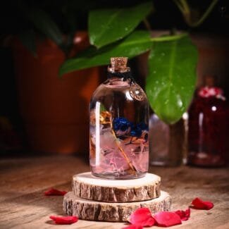 Soft Love Tone Glass Garden with real preserved flowers in mineral oil cork bottle by MystikFalls