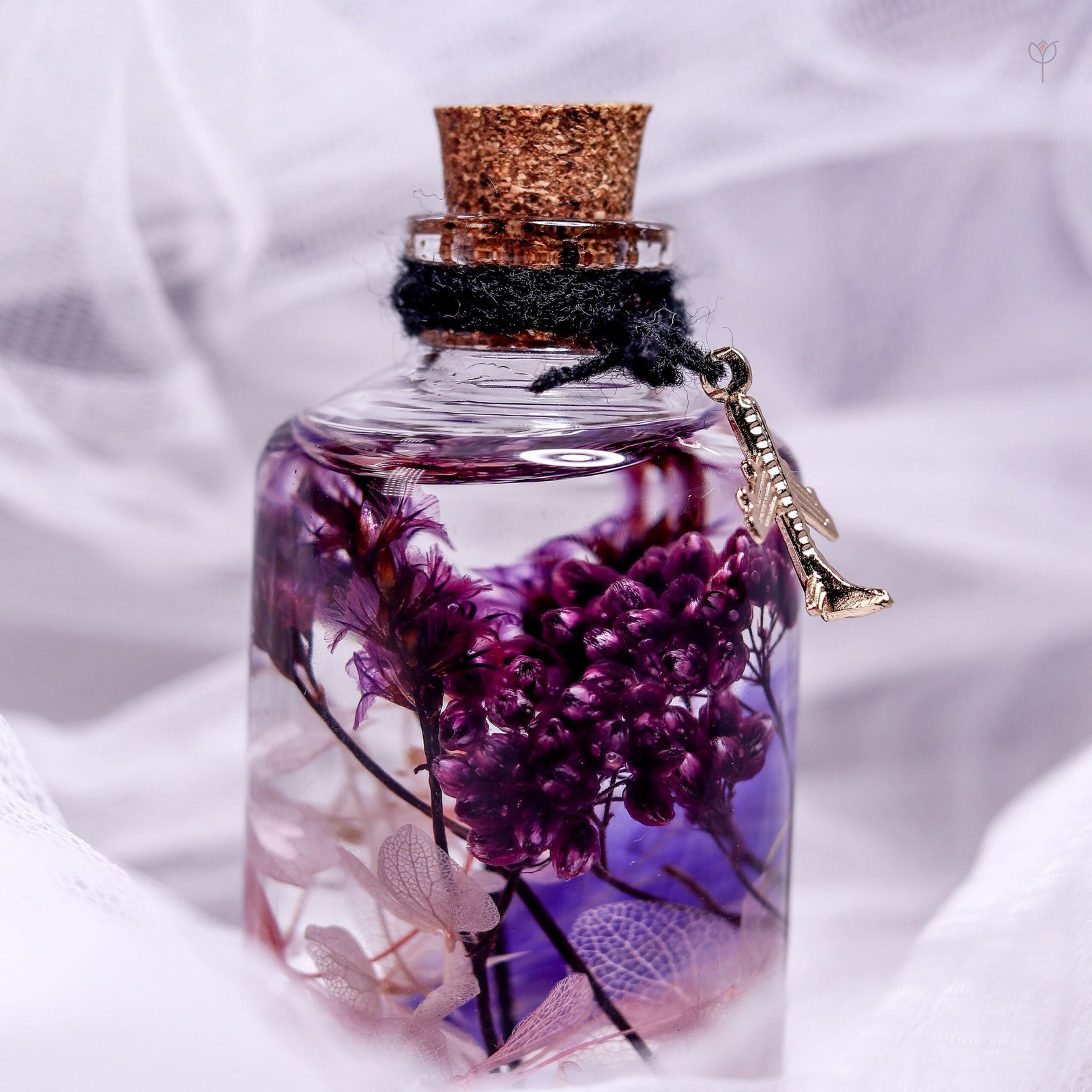 violet-veil-glass-garden-elegant-dark-decor-display Violet Veil Glass Garden displayed as elegant dark purple botanical home decor on a wooden log stand
