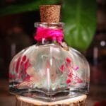 Whispers Of Baby's Breath Preserved Glass Garden close-up showing real baby's breath and hydrangea in mineral oil