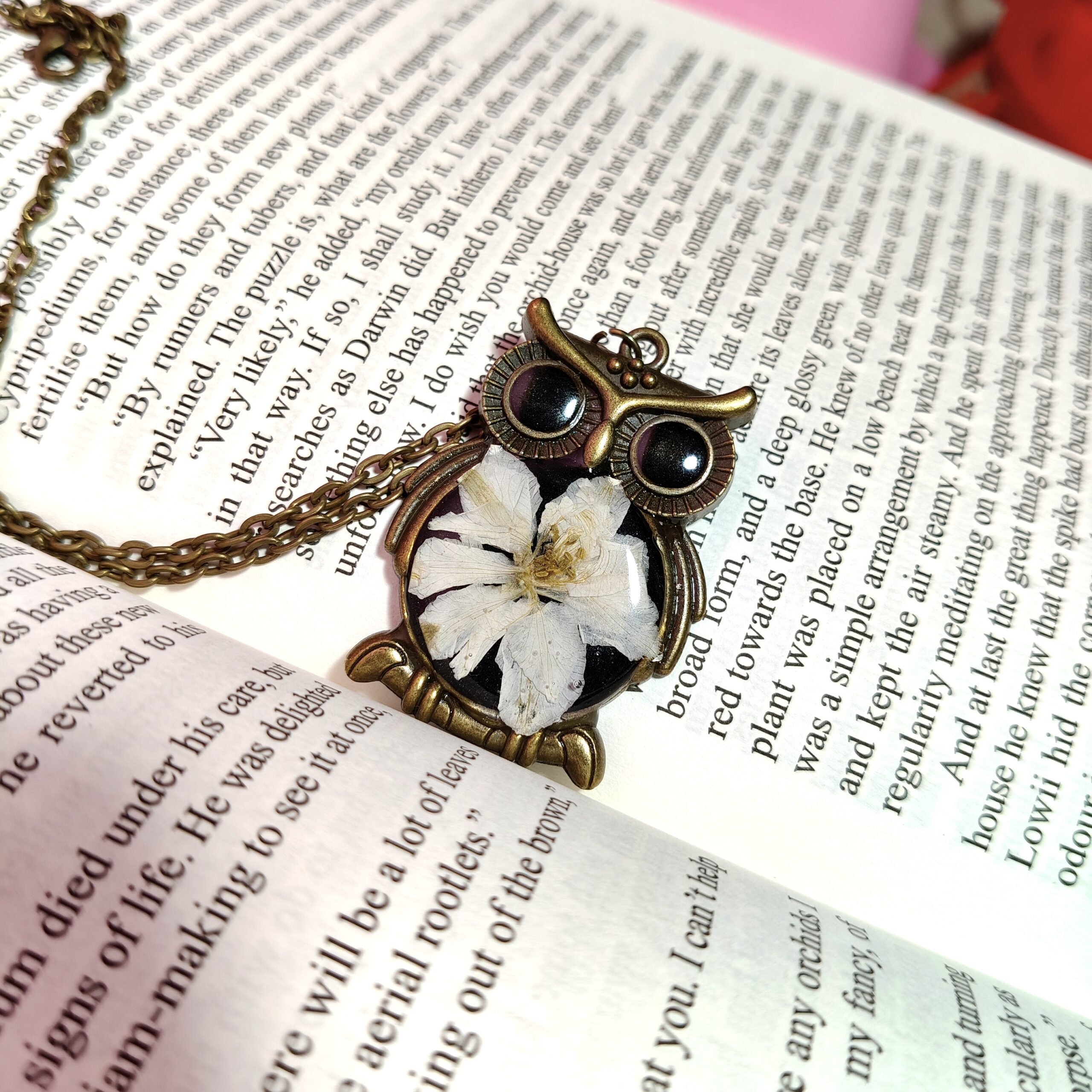 BotaniOwl pendant featuring real flower preserved in resin