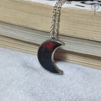 Crimson Moon pendant with deep red resin design