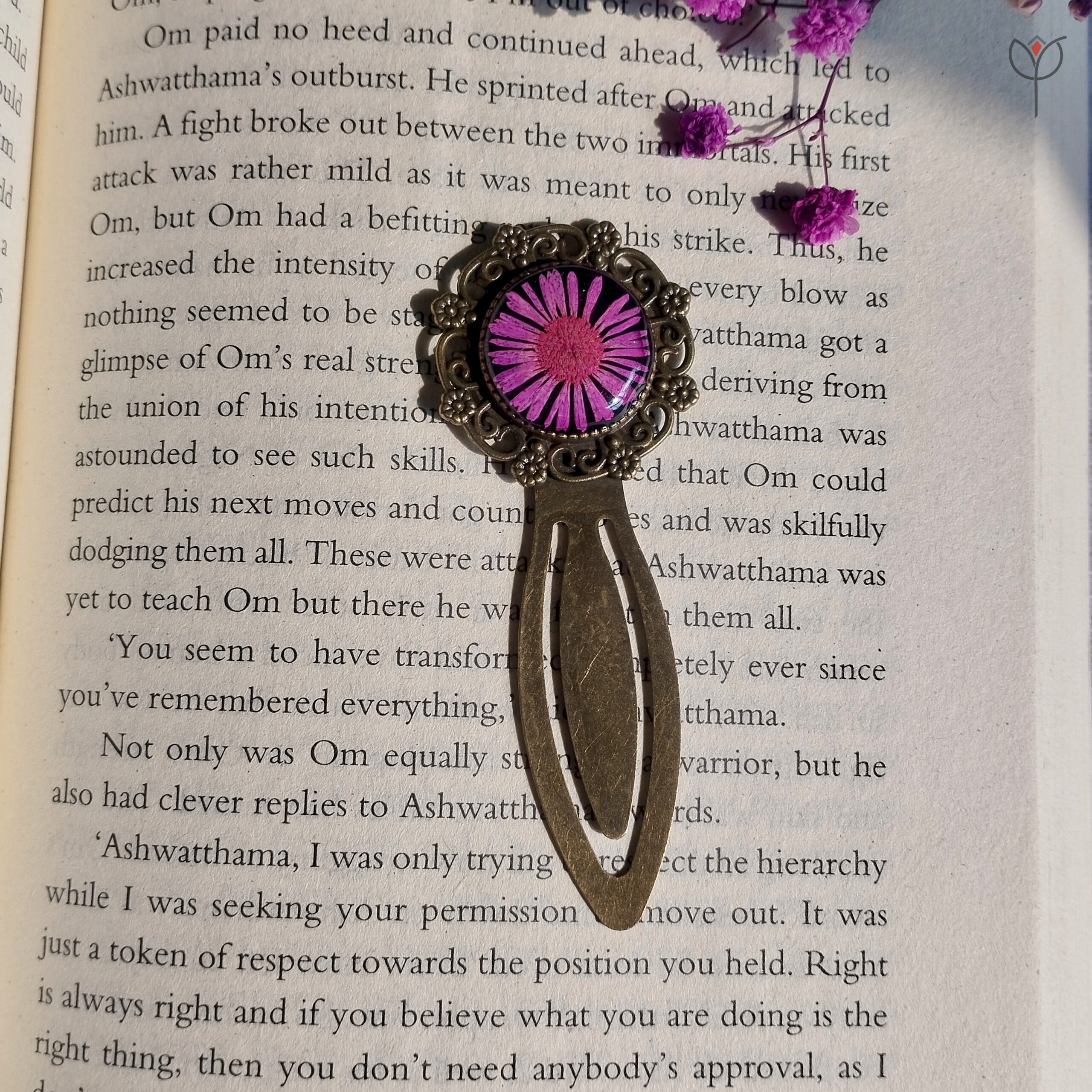 fallen-star-flower-bookmark-antique Pressed pink aster flower bookmark with antique base.