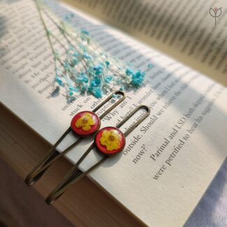 Plum resin hair clips made with real dried plum flower in a resin finish